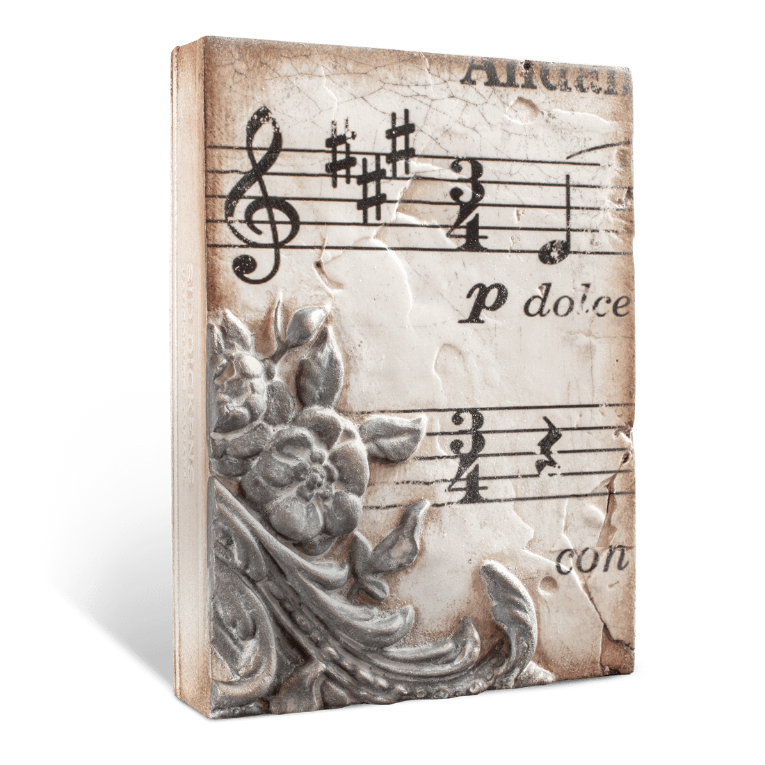 Decorative tile with musical notes and floral design on a white background