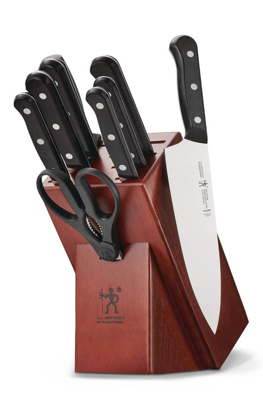 Knife set with wooden block on a white background