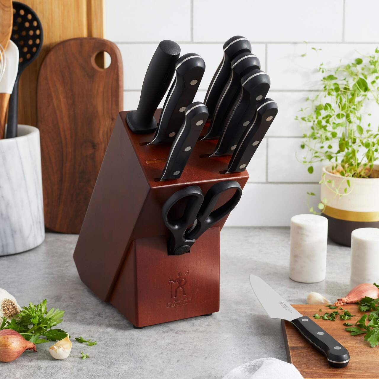 Knife block set with knives and scissors on a kitchen counter