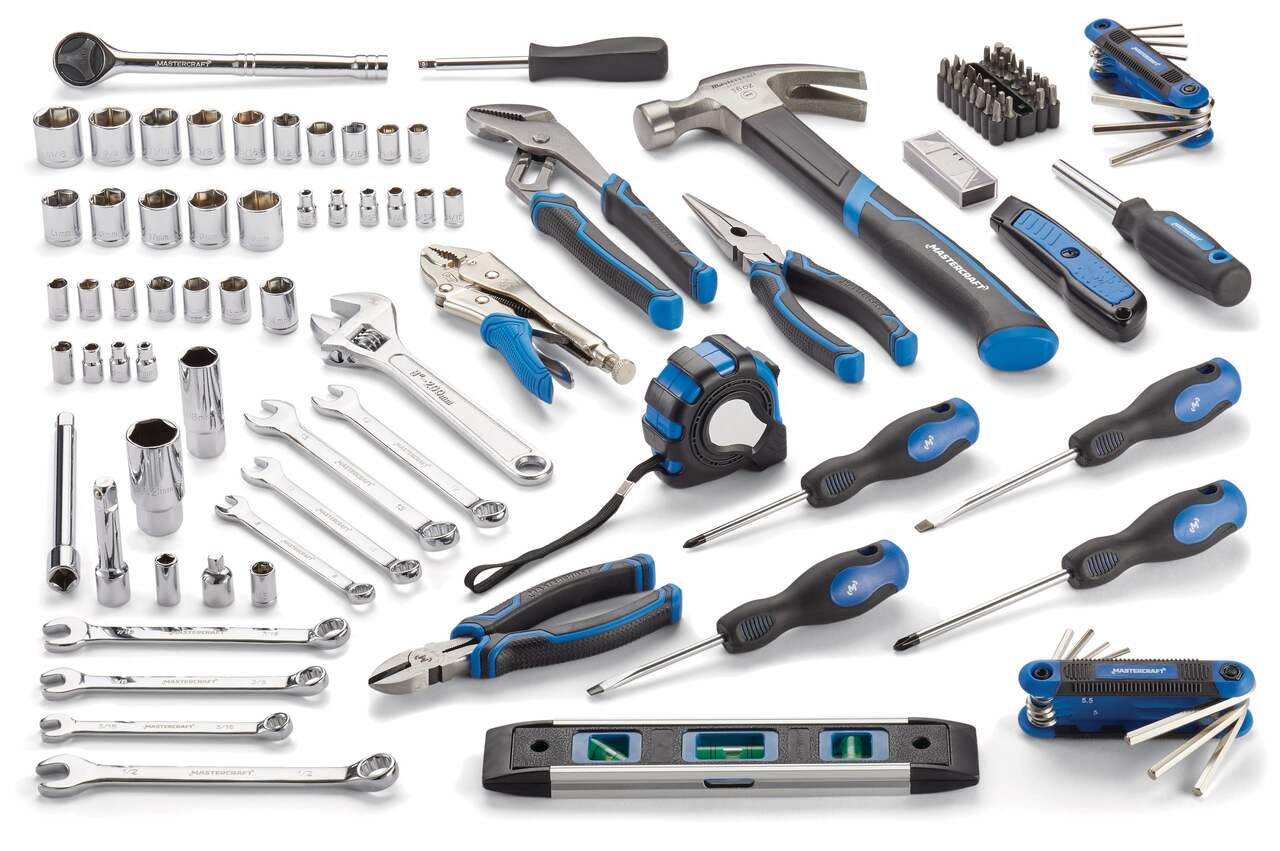 Collection of various tools including wrenches, screwdrivers, and pliers on a white background