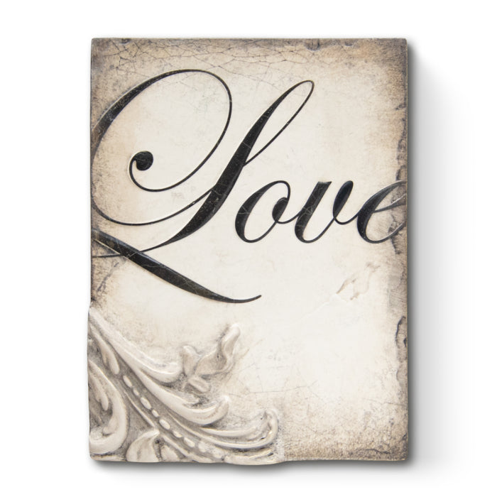 Decorative tile with the word 'Love' in cursive on a textured background